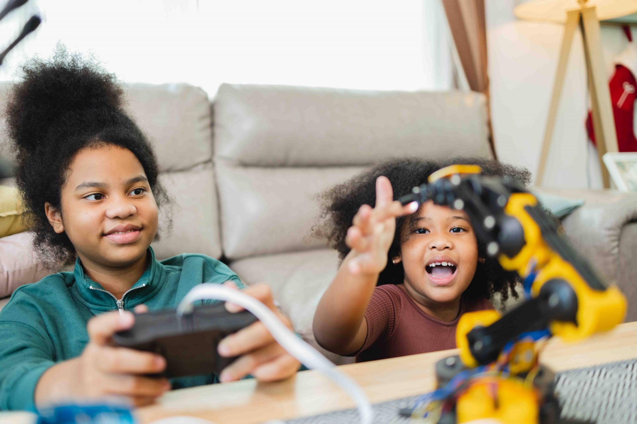 two-african-american-girls-learned-robot-arms-with-2025-01-09-03-04-21-utc