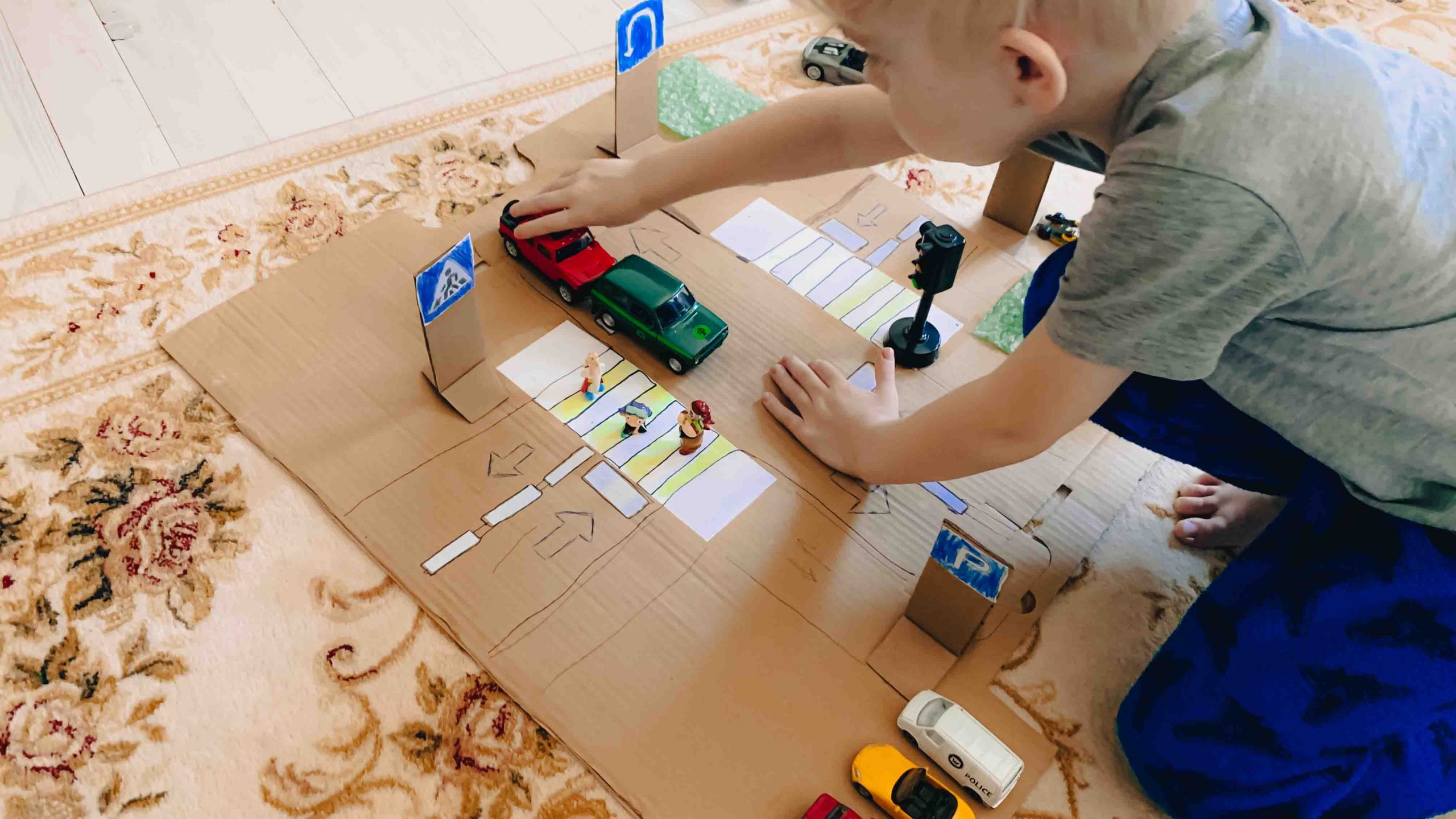 a-child-plays-a-homemade-game-made-of-cardboard-tr-2024-12-10-03-37-59-utc