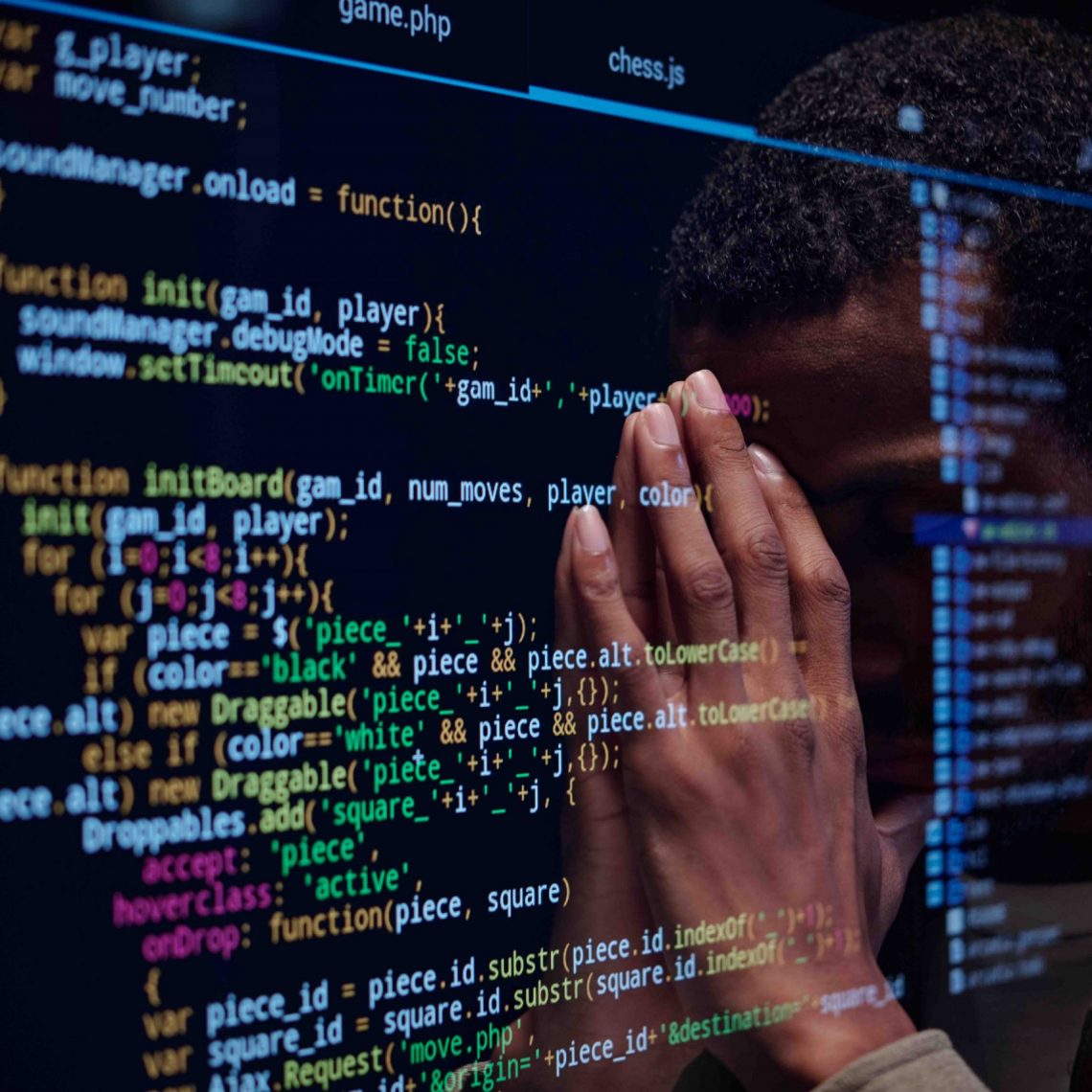stressed-developer-reviewing-complex-code-on-scree-2025-01-29-14-50-22-utc